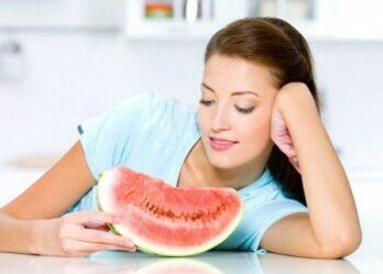 A girl follows a watermelon diet in the fight against excess weight. 
